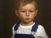 Boy in overalls